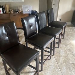 Brown leather Counter Height Stools (4) 