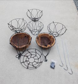Seven hanging plant baskets