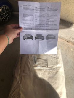 Light tan off white love seat slip cover