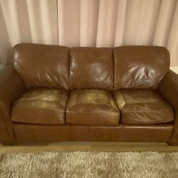 Used Leather Or Faux Leather Couch