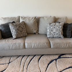 Gently Used Cream Color Couch With Reversible Cushions!