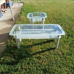 Glass Sofa table and  Glass end table Excellent  condition.. Smoked glass Very Classy Effect..
