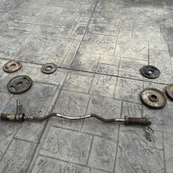 Free Curl Bar With 70lbs Of Weight 