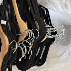 Velvet and wooden hangers