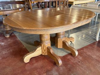 Warm Blonde Oval Double Pedestal Dining Table