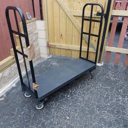 WeBuy • Used moving carts in good condition, 14 inches wide by 54 inches long, holds over 5,000 pou...