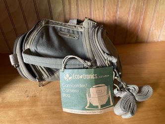Camera bag with strap and pockets