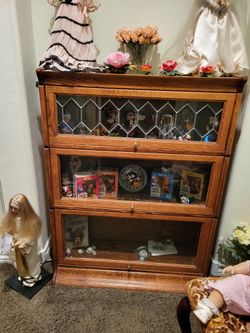 Bookshelves, the ones with 3 tears $500, the ones with 4 tiers or $700. Oak glass doors