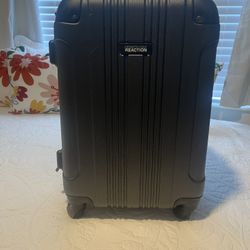 Used  Kenneth Cole REACTION Out of Bounds Lightweight Hardshell 4-Wheel Spinner Luggage, Charcoal, 20-Inch Carry On In Excellent W