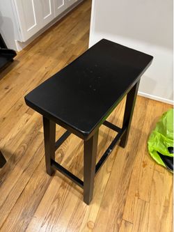 Black wooden bar bench