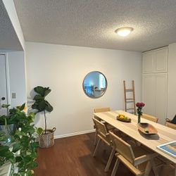 WOOD DINING TABLE AND RATTAN CHAIRS