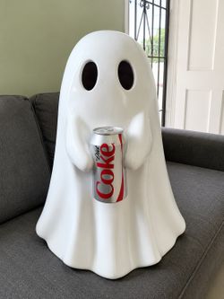 Viral ghost holding Diet Coke
