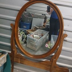 Tilting mirror