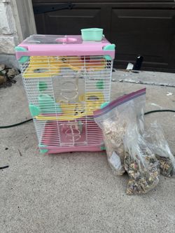 Hamster Cage With Bedding And Food 