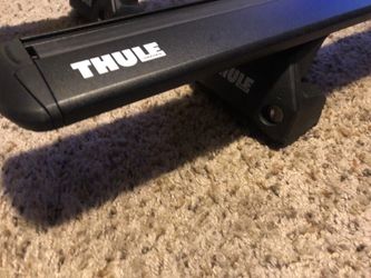 53” Thule roof rack cross bars with BMW kit