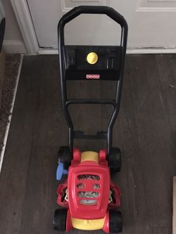 Kids lawn mower by Fisher Price