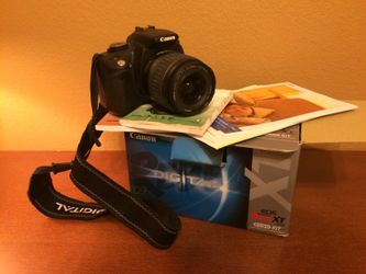 Canon EOS XT rebel SLR with lens