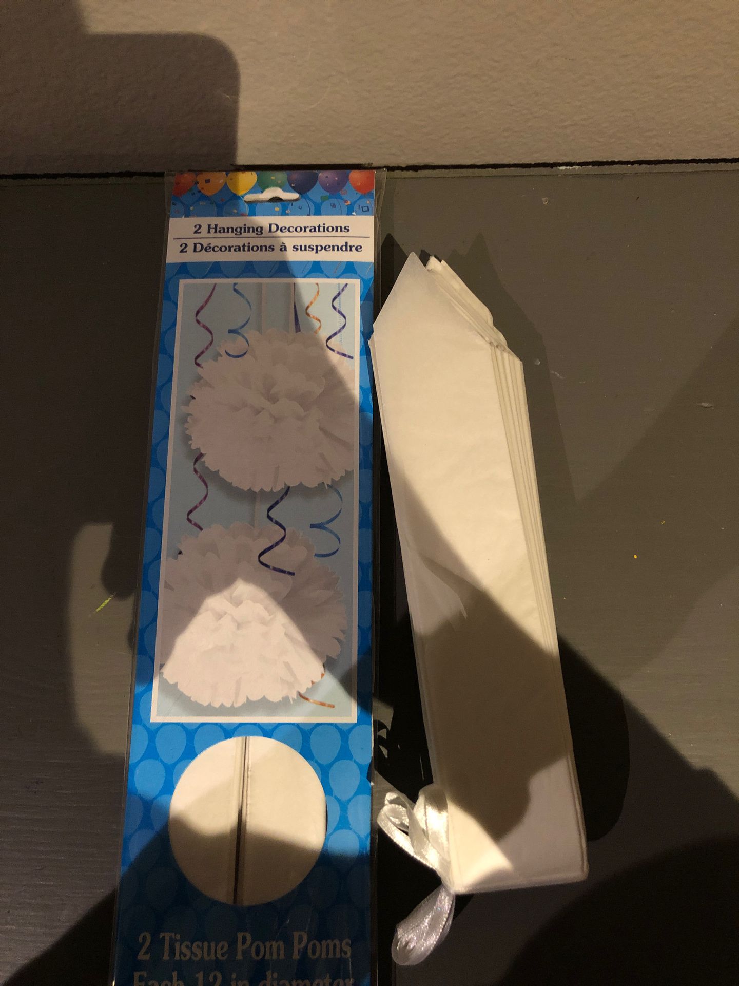 2 tissue pompous, and a paper decoration