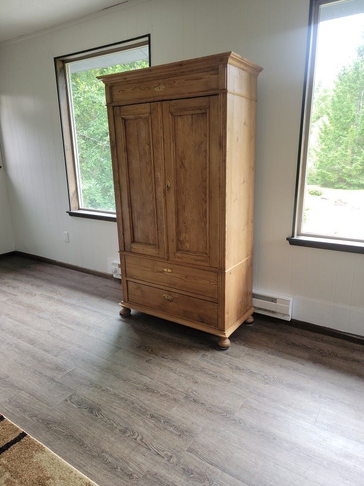 Handmaid wooden hutch.