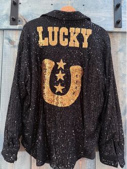 Ladies Large black and gold sequin shirt w LUCKY on back