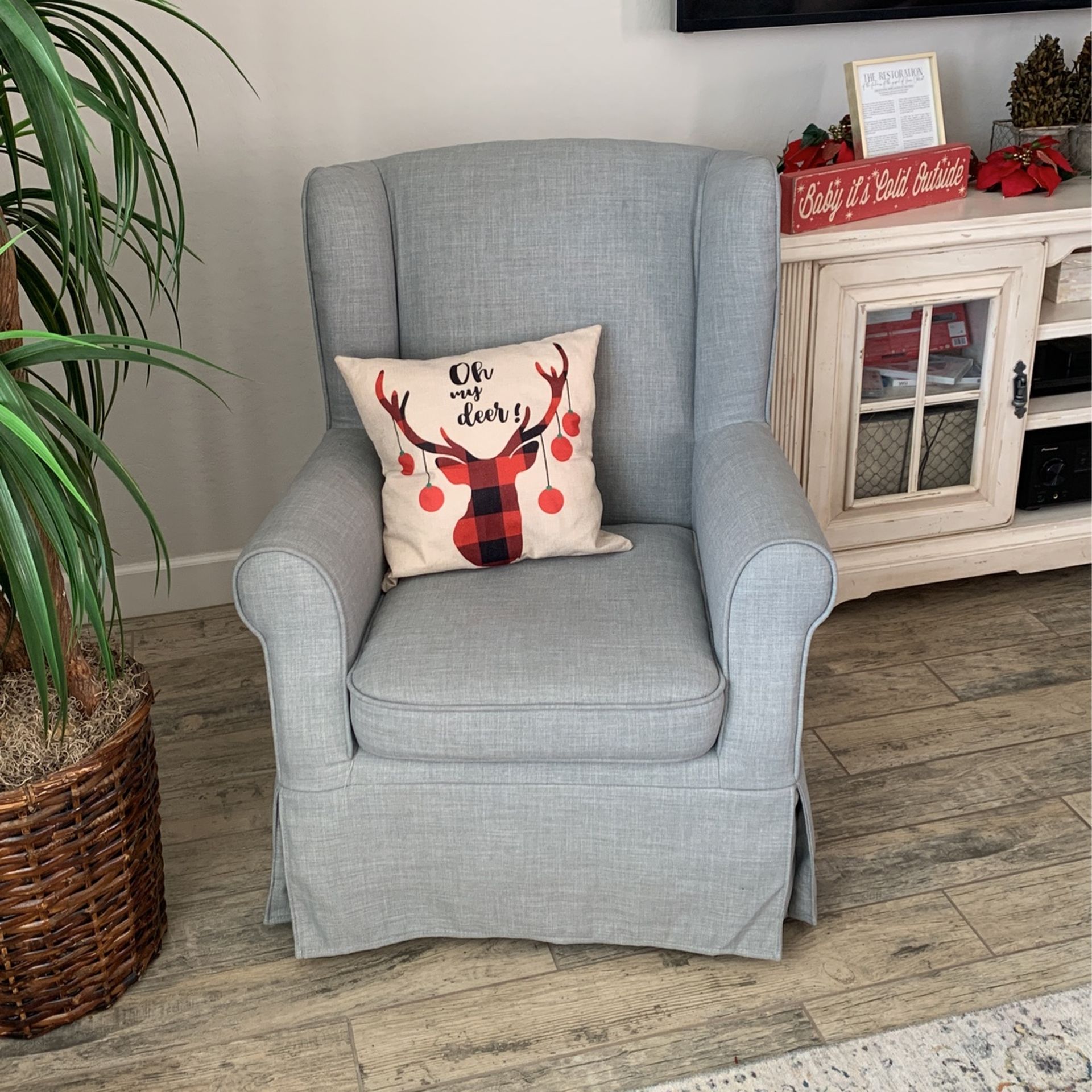 Gray Wing Backed Chair Used In Nursery