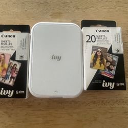 Used Once Canon Ivy Photo Printer And 20 Photos 