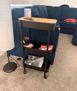 Two wood top rolling carts