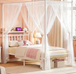 Twin canopy bed frame with storage headboard
