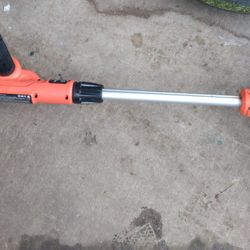 Corded Weedwacker. 2 Crates. 6 Foot Digging Bar. 6 Wood Ladder. Tree Branch Trimmer 