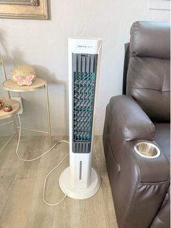 Arctic air tower electric portable cooling fan quick operation for speed white color retail price $130 plus tax asking price $80