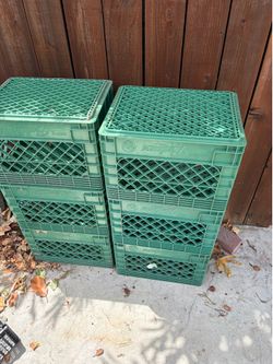 Green plastic milk crates