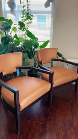 2 mid-century leather chairs