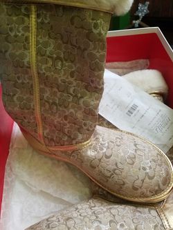 New. Coach Nikole Signature C Gold Boots size 6 NEW