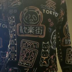 Black long sleeve shirt with pink and white designs