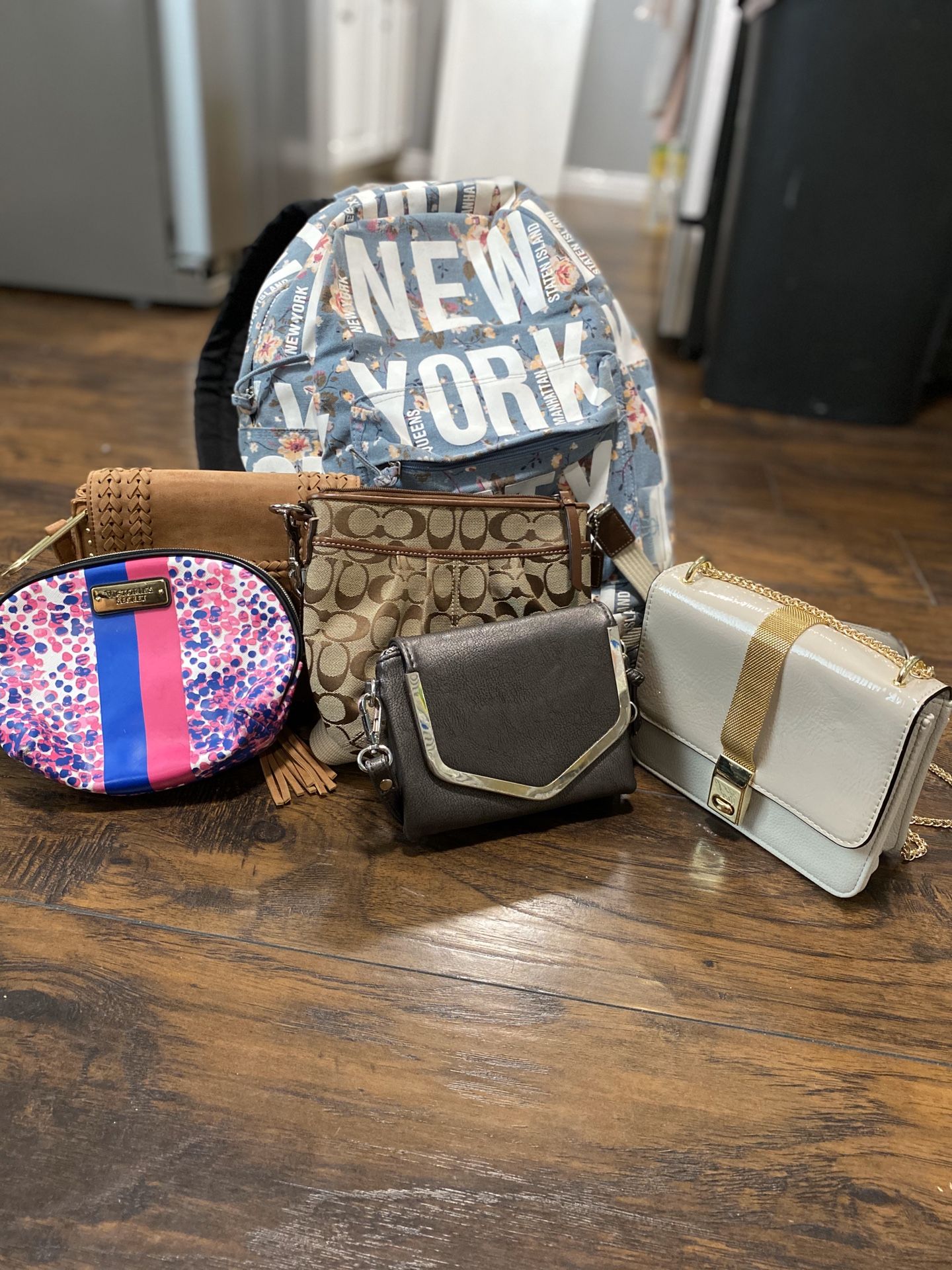 Purses plus a backpack