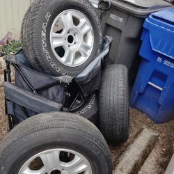 Set of 4 Tires and Wheels Michelin and Goodyear P235/70R16 M+S