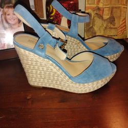 Never worn Michael Kors blue suede wedges