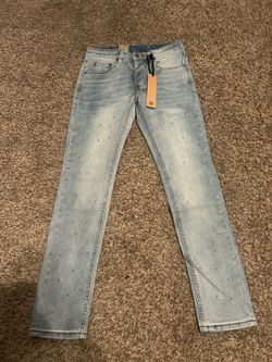 Washed blue Ksubi jeans