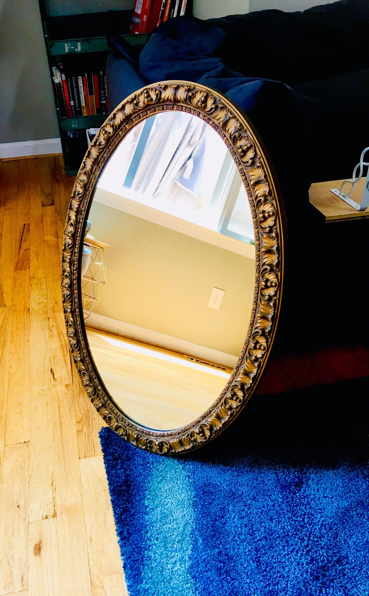Oval Mirror with metal detailing