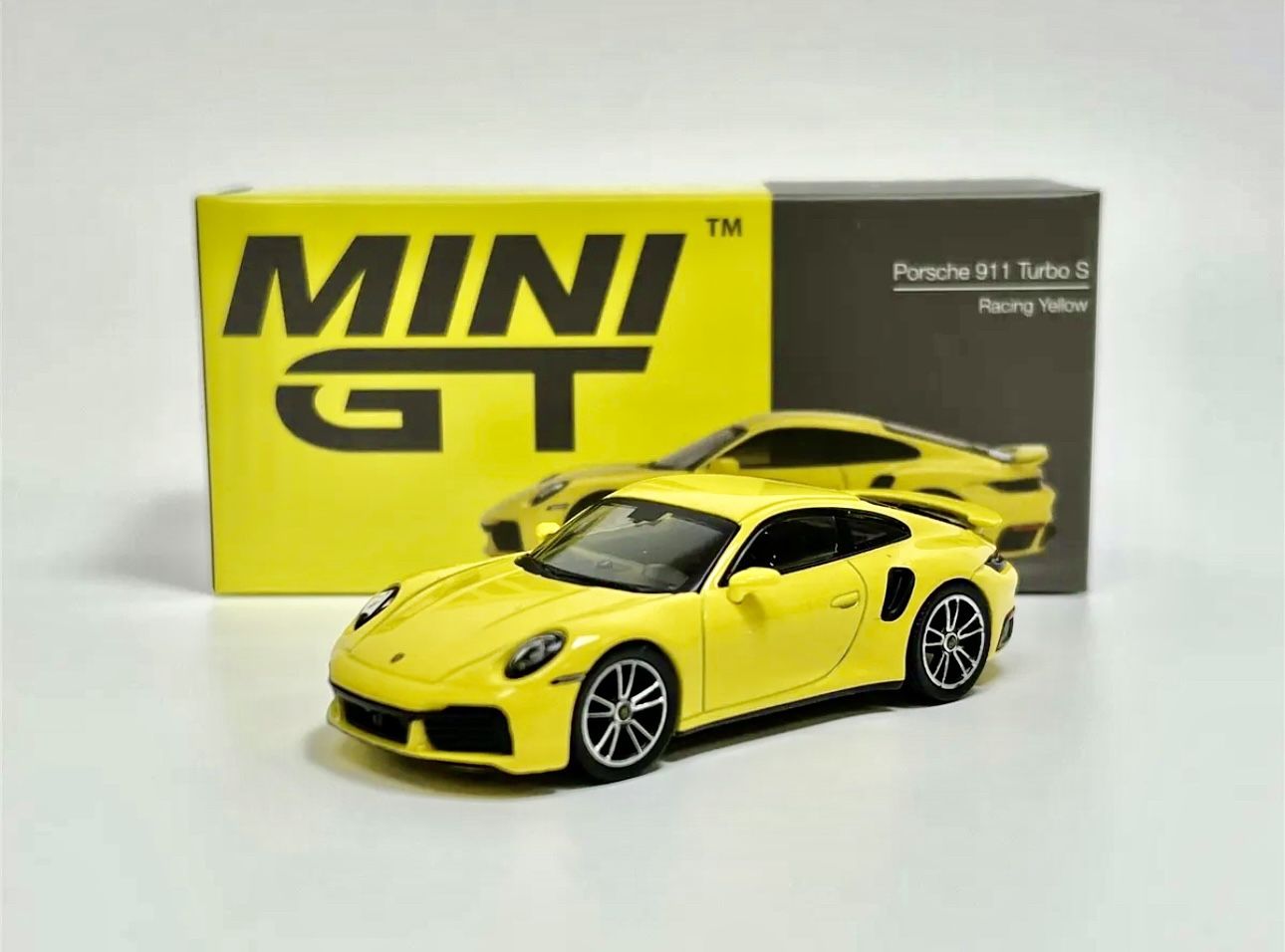 2023 Mini-GT Overseas Box Version: LHD Racing Yellow PORSCHE 911 Turbo S #497