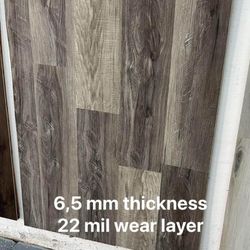 🏡Vinyl Luxury-SPC flooring for sale  5mm-5.5mm-6.5mm-7.5mm 20 &22 mil layer  100% Waterproof  Padding attached  Rigi core Delivery available