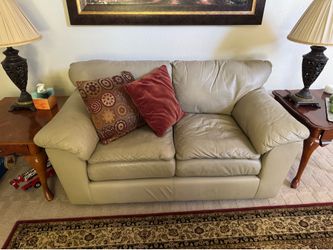 Leather love seat.  Clean with no rips or tears.