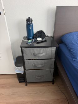 Black and gray Bedside table