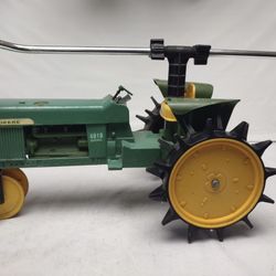 John Deere 4010 Diesel Tractor Traveling Lawn Sprinkler