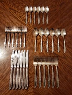 Oneida Fascination Brittany Rose silver plated flatware set.
