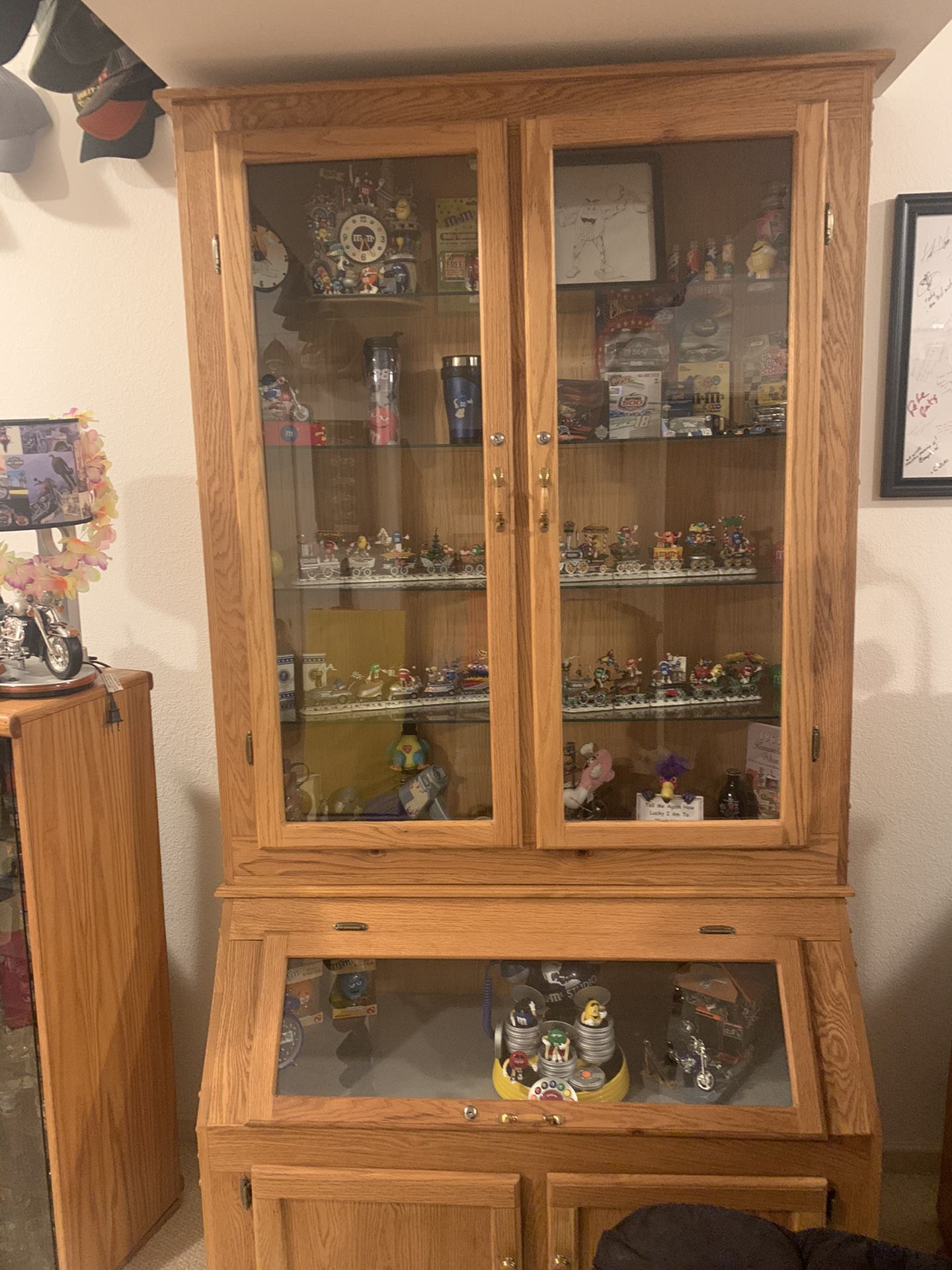 Gun cabinet converted into a decorative stand with glass shelves