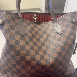 This bag is still very sturdy, lil damage  preowned