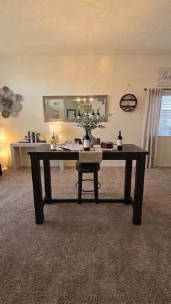 Like New Dark Wood Bar Height Table and Swivel Stool