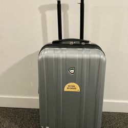 MIA TORO 22 Italia Expandable Luggage Gray 4 Wheels Have Duty Structure Suitcase  Like New Size  22” Hex 13”w X9.5” D