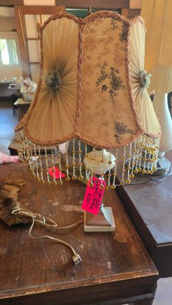 Brass, marbe & uranium glass lamp. With beaded lamp shade.